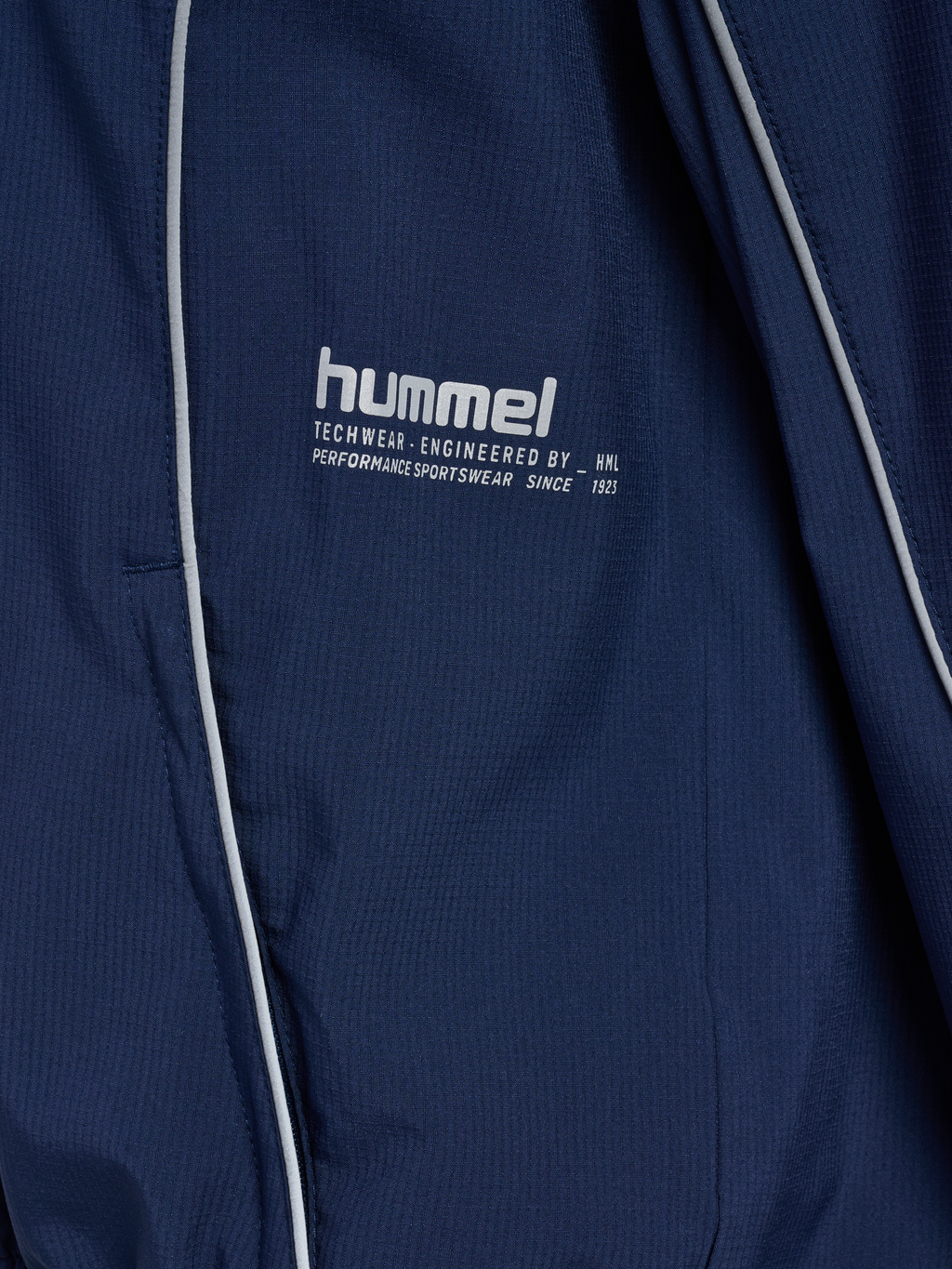 hmlPULSE WOVEN W ZIP THROUGH